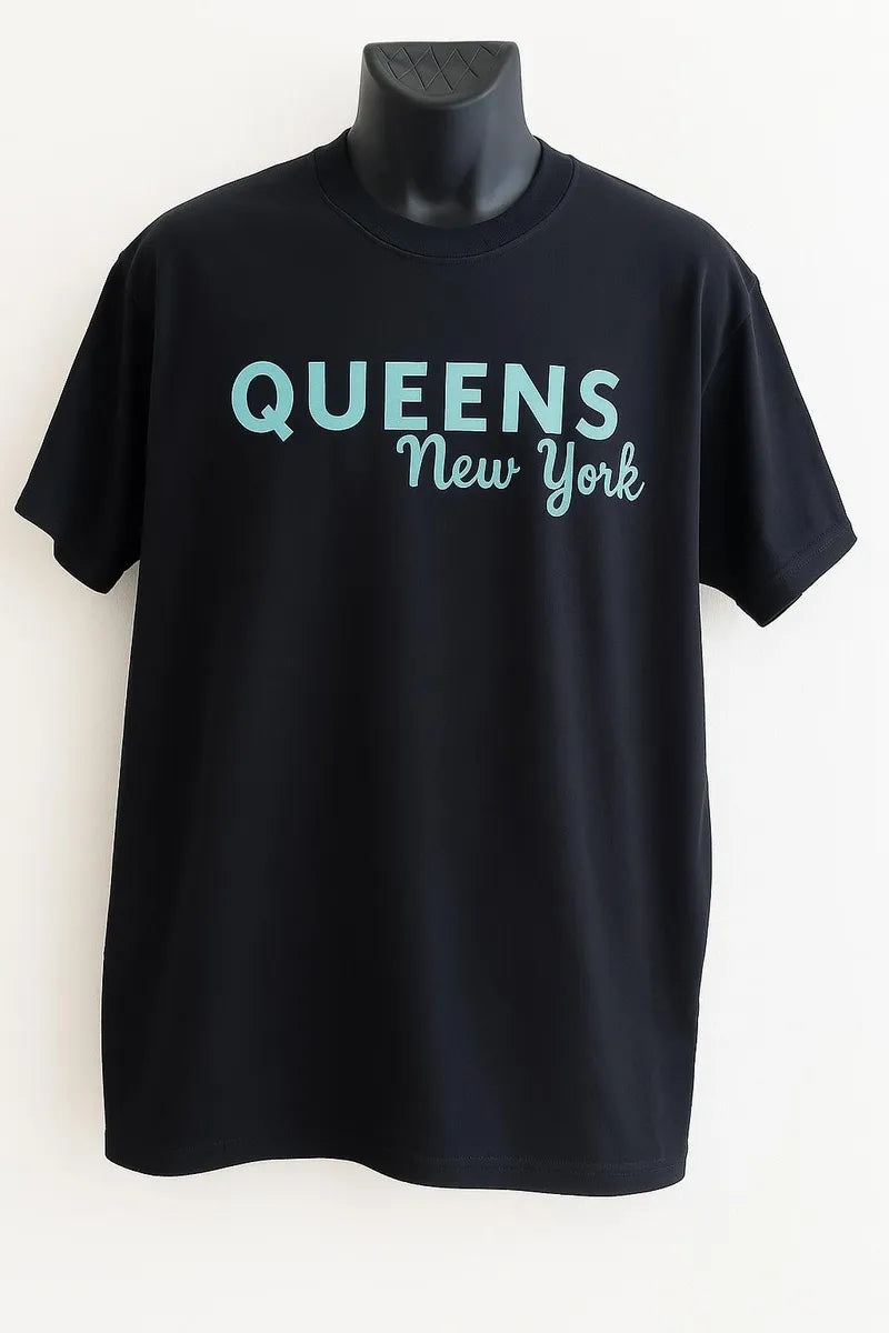 Black graphic t-shirt featuring the phrase "Queens Never Quit" in stylish typography, motivational women's statement tee for confidence and everyday wear.