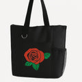 Black reusable tote bag featuring a red rose floral design with green leaves, stylish shoulder tote for shopping, travel, work, groceries, books, everyday carry, floral gift bag, and casual fashion accessory