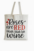 Funny Roses Are Red Wine Tote Bag featuring a humorous wine quote with decorative hearts and stylish typography on a reusable shopping tote for wine lovers.