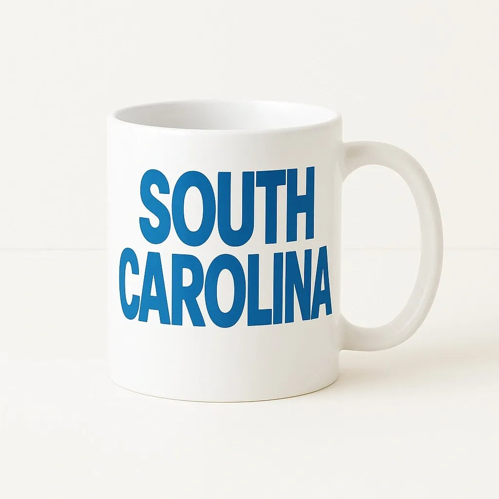 White ceramic coffee mug featuring bold blue South Carolina text design. Perfect gift for South Carolina residents, travelers, tourists, locals, coffee lovers, tea drinkers, and state pride enthusiasts. Great for home, office, birthdays, holidays, and souvenirs.