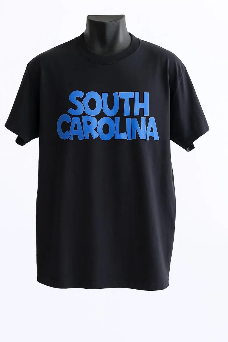 Black graphic t-shirt featuring South Carolina text in bold blue typography, unisex state pride shirt perfect for travel, souvenirs, and everyday wear.