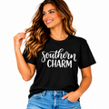 Southern Charm black graphic T-shirt with white lettering styled with blue jeans.