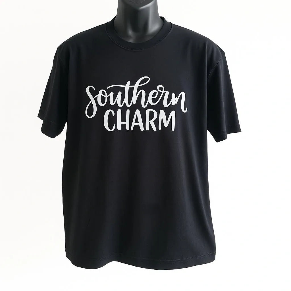 Black graphic t-shirt featuring Southern Charm typography design in white lettering, soft unisex casual shirt for everyday wear and southern lifestyle fashion
