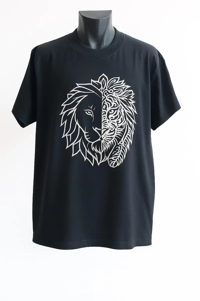 Black unisex graphic t shirt featuring a split lion face design in white line art with one side realistic and the other side ornamental tribal artwork symbolizing strength confidence and courage.