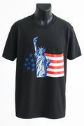 Black short sleeve graphic t-shirt featuring Statue of Liberty and American flag design, patriotic unisex streetwear tee by LB AND SK DESIGN SHOP