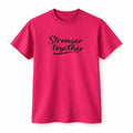 Pink unisex graphic T shirt featuring the words Stronger Together in stylish script lettering with an uplifting unity and encouragement design.