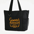 Black reusable tote bag featuring a yellow Summer Vibes design with palm trees, lightweight shoulder tote for beach trips, travel, shopping, groceries, vacations, and everyday carry