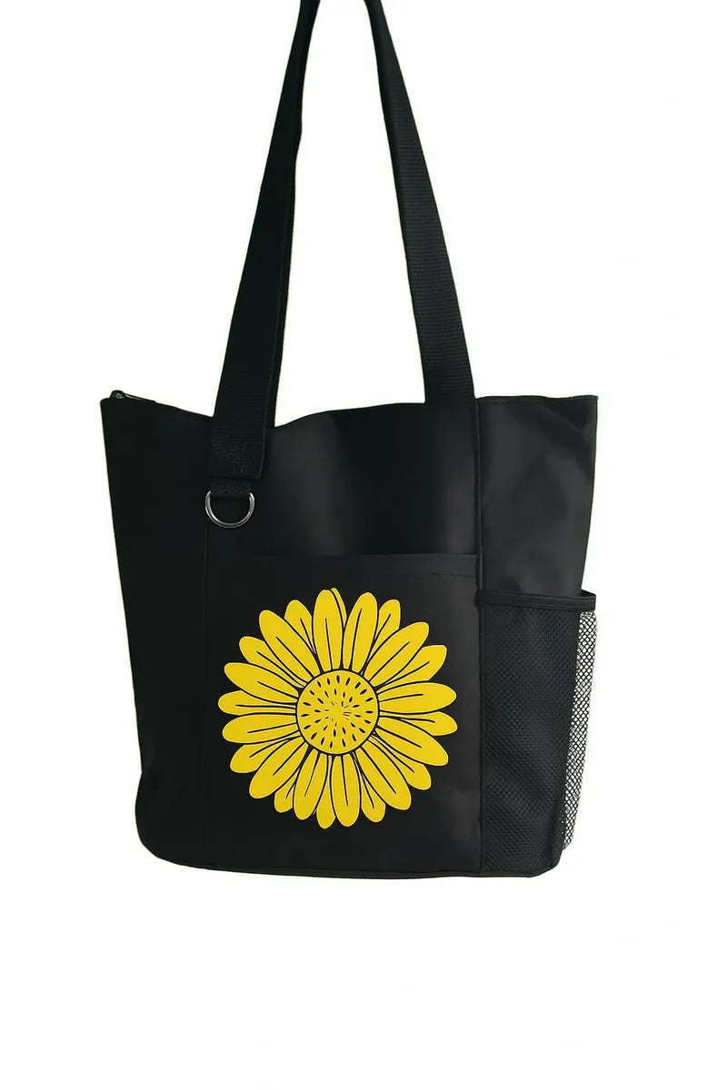 Black tote bag featuring a bright yellow sunflower design on the front. Lightweight reusable shoulder tote with long handles for comfortable carrying. Perfect for shopping, books, work, travel, school, farmers markets, and everyday errands. The cheerful sunflower artwork adds a vibrant floral touch to this practical carryall bag. Ideal for women, flower lovers, gardeners, students, teachers, and anyone looking for a stylish and functional everyday tote bag.