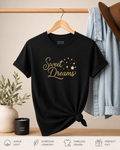 Black graphic t-shirt featuring elegant Sweet Dreams lettering design, cozy unisex casual tee perfect for lounging, sleepwear style, and everyday comfort.