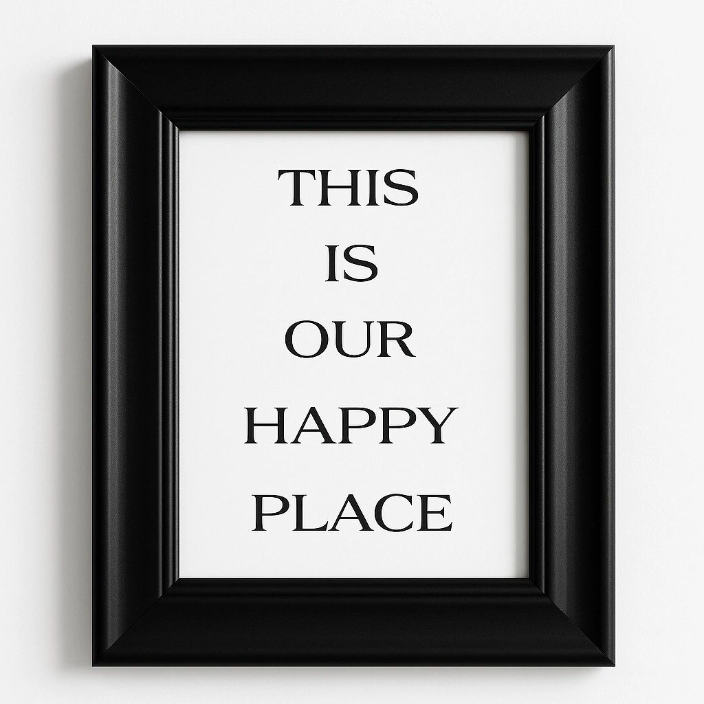 Minimalist This Is Our Happy Place framed wall art featuring elegant black typography in a modern black frame for living room, family room, entryway, and home décor.
