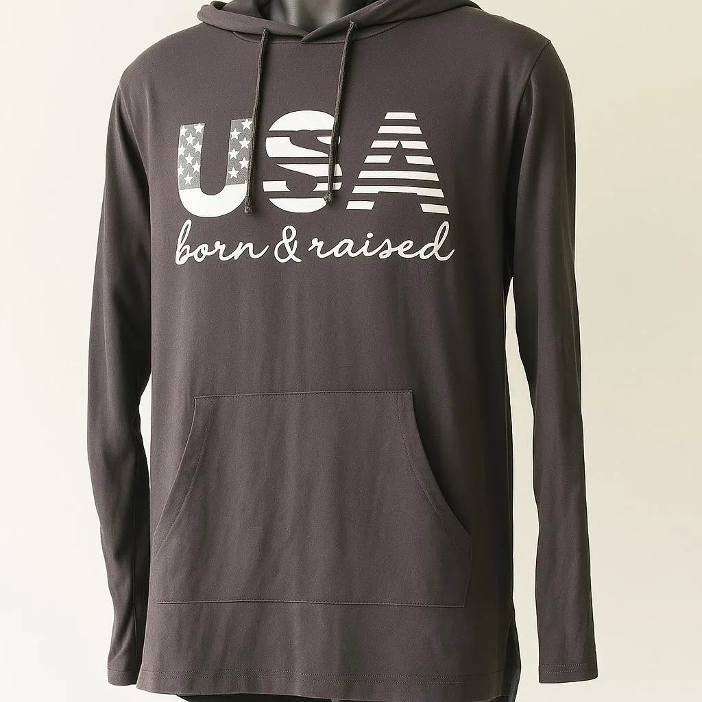 Black USA Born and Raised graphic hoodie with patriotic text design, casual unisex pullover hoodie for everyday streetwear, American pride fashion, and relaxed comfort by LB AND SK DESIGN SHOP