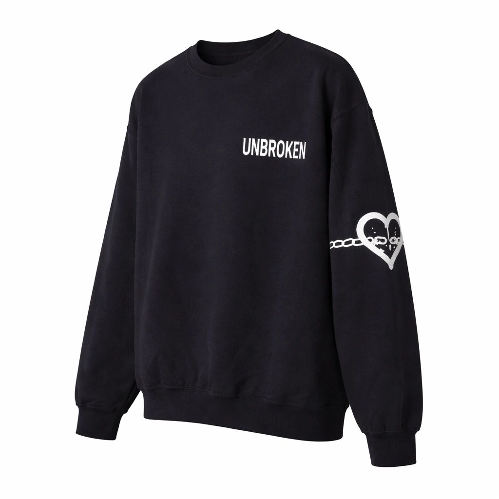 Black unisex crewneck sweatshirt featuring the word "Unbroken" with a heart graphic on the sleeve. Cozy fleece pullover for everyday comfort and modern style.