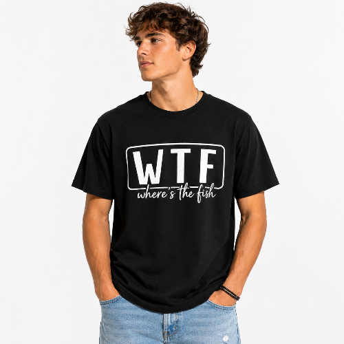 A man wearing a black short-sleeve t-shirt with a white graphic print that reads 'WTF where's the fish', paired with light blue jeans, against a plain white background.