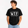 A man wearing a black short-sleeve t-shirt with a white graphic print that reads 'WTF where's the fish', paired with light blue jeans, against a plain white background.