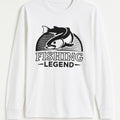 White long sleeve graphic shirt featuring a fish illustration with the text “Fishing Legend,” fishing themed graphic shirt on white background