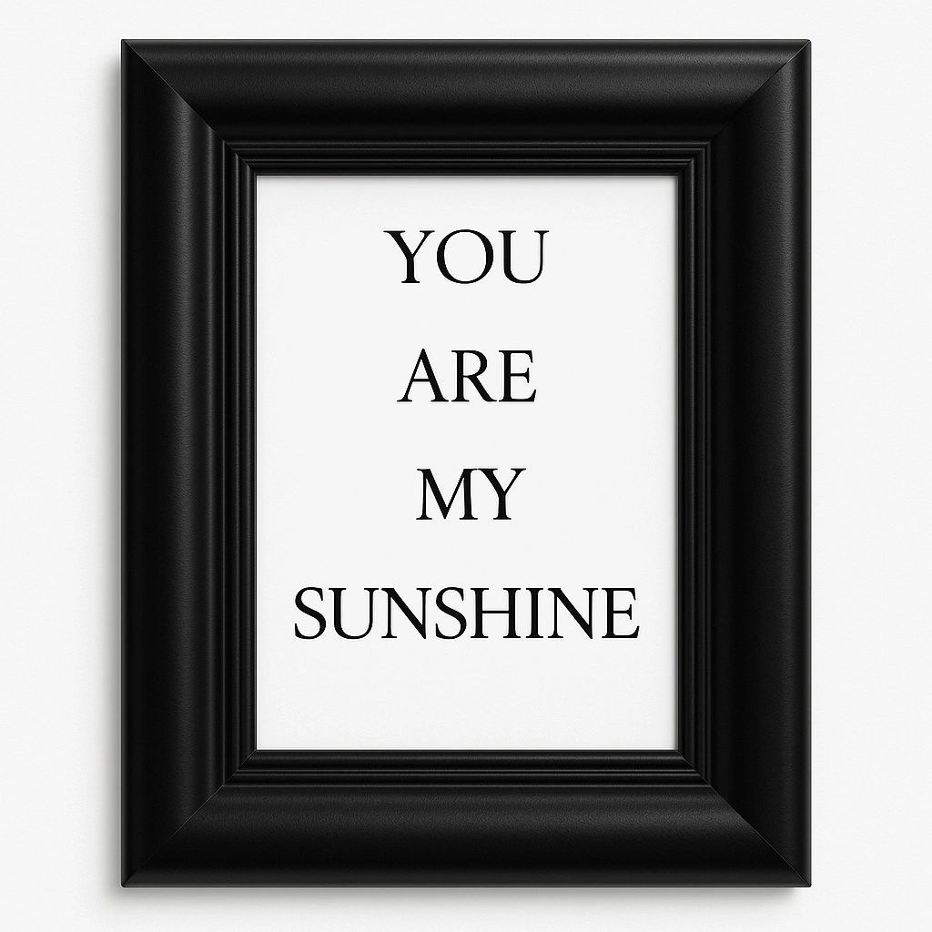 Minimalist You Are My Sunshine framed wall art featuring elegant black typography in a modern black frame for nursery, bedroom, living room, and home décor.